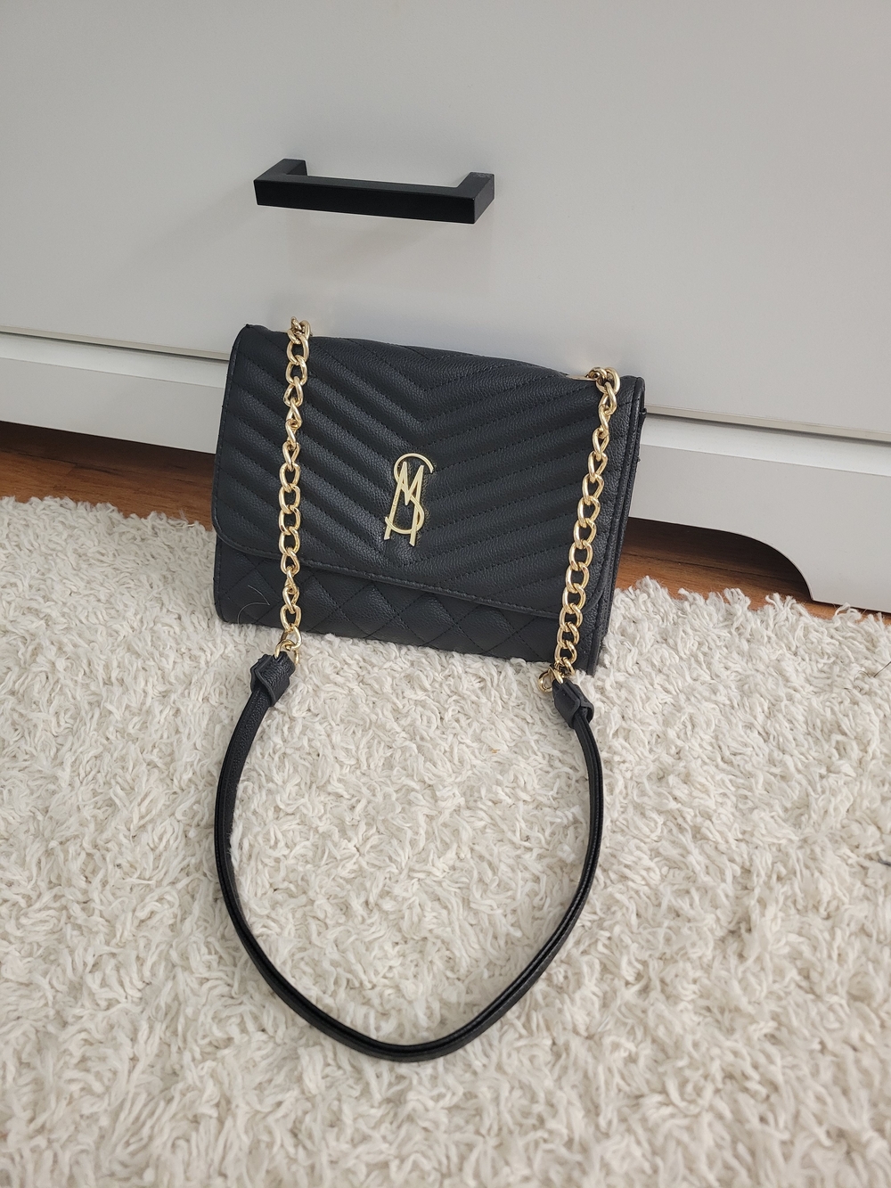 Black Quilted Shoulder Bag with Gold Chain Strap